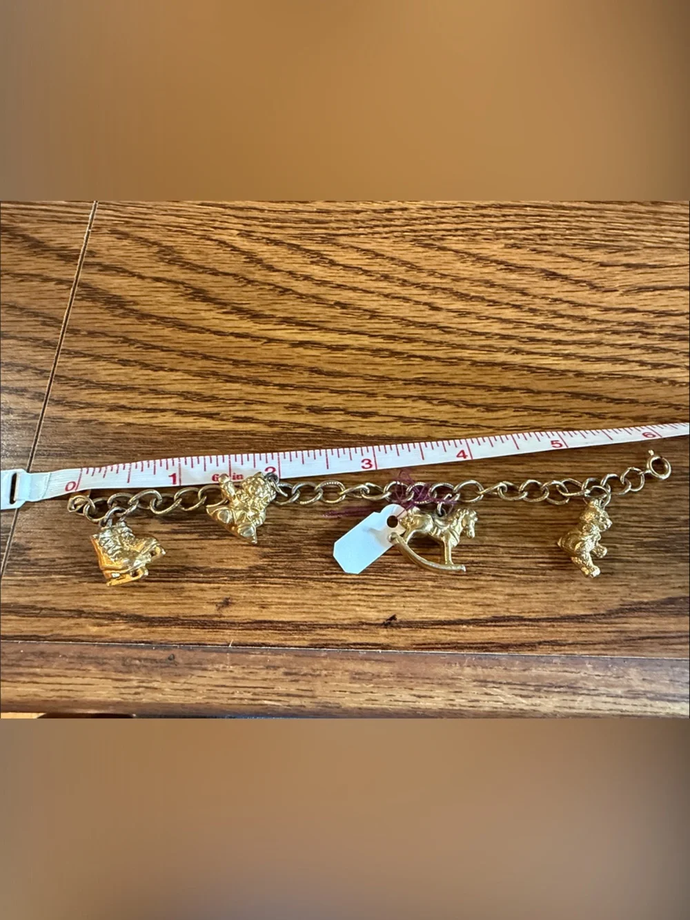 Avon Gold-Tone Toy Charm Bracelet with Rocking Horse & Teddy